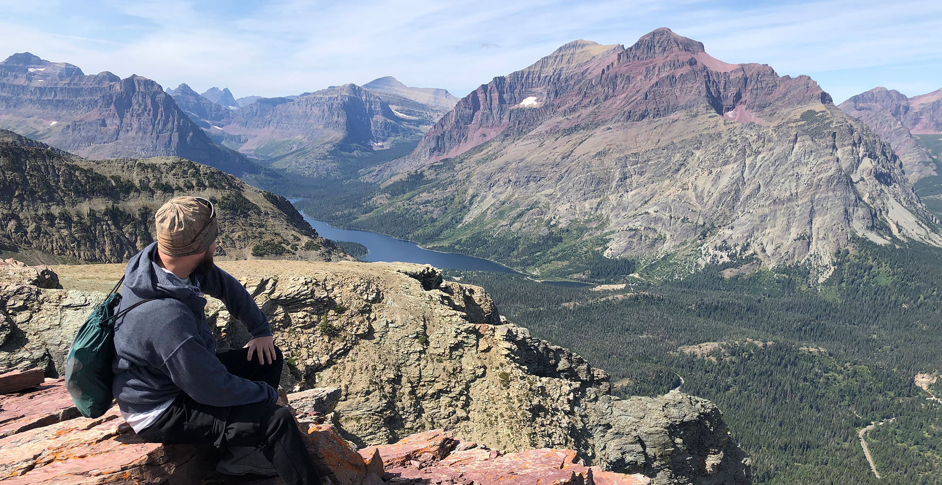 Traveler admiring the views of Glacier National Park